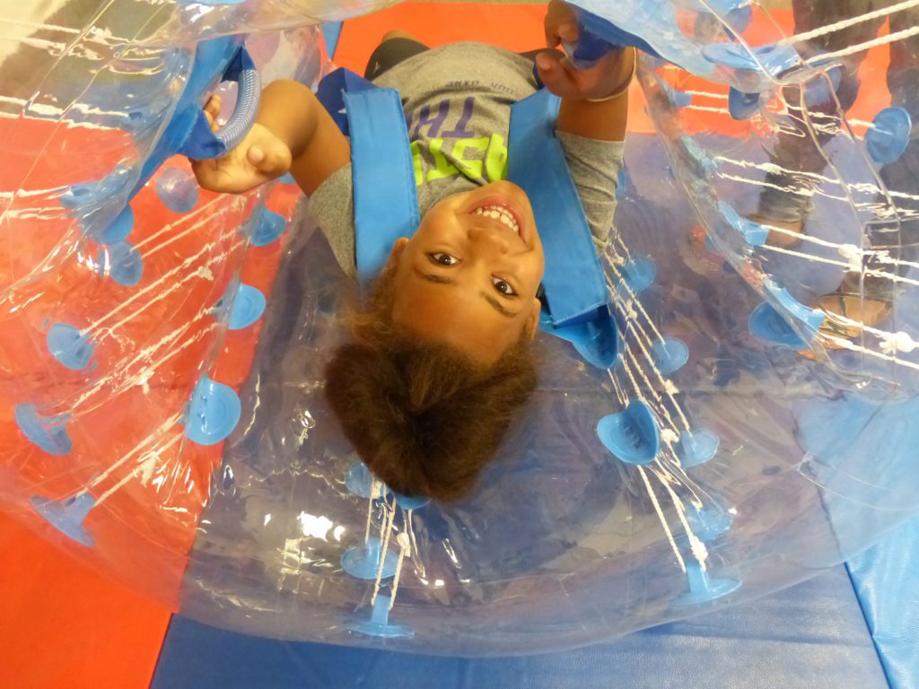 Kid in a bouncy ball