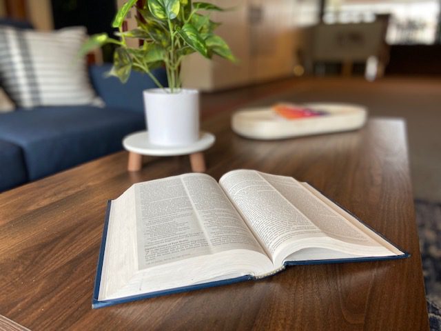 Open Bible on a coffee table